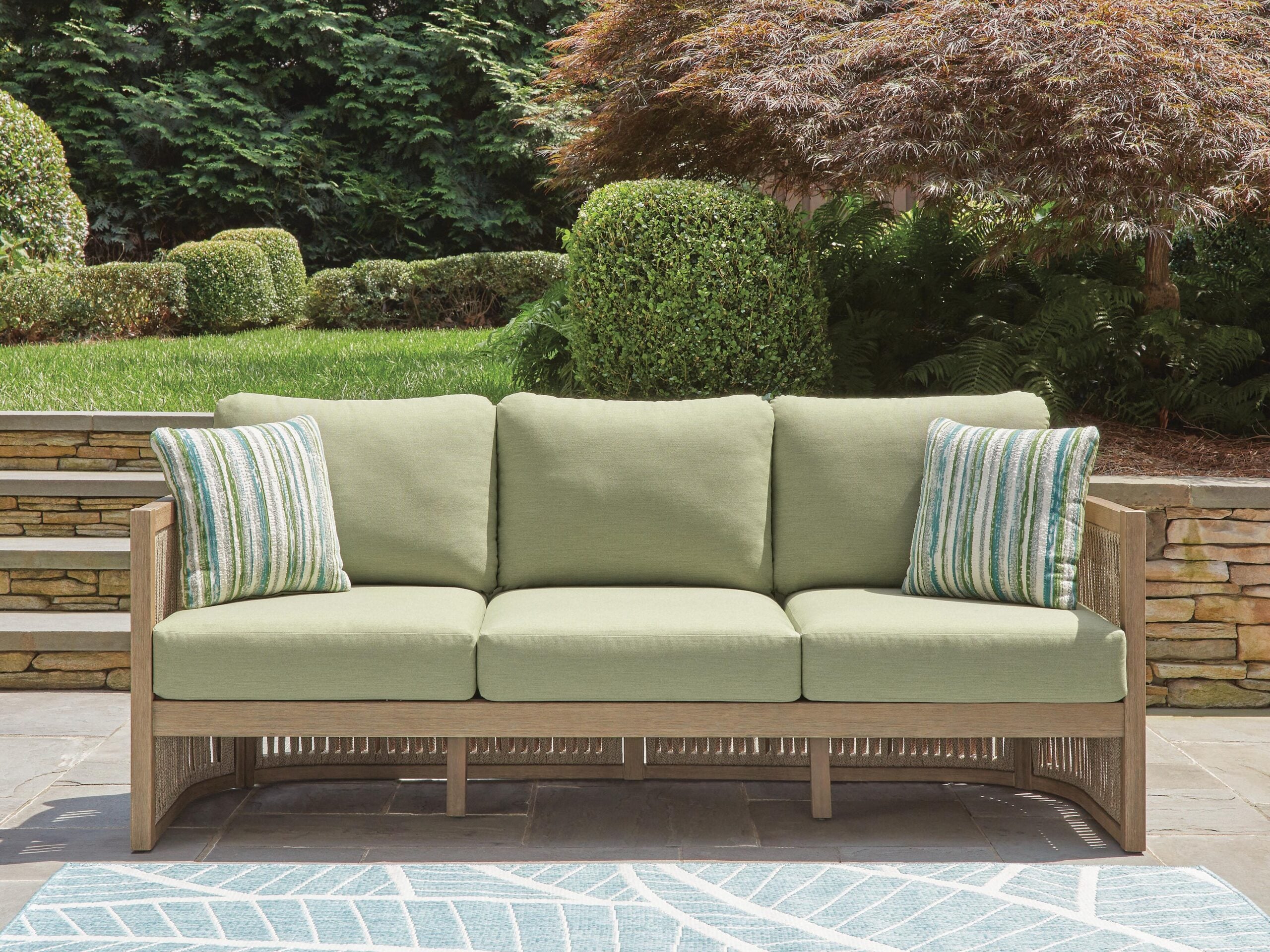 adbe69b54fc6d11c3152f8a6709a4cc6 Serena Shores Outdoor Sofa with Cushion - Image 1